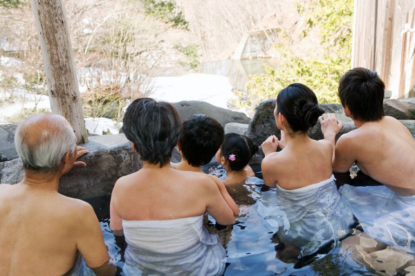 Three-generation family in hot spring
